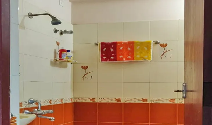 Bathroom with shower and sink